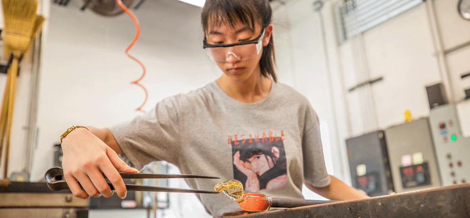 Student working with Glass